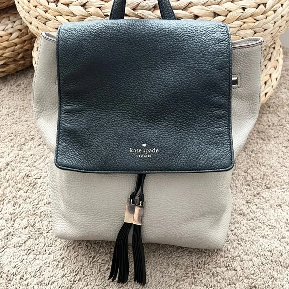 Kate Spade soft pebbled leather two tone drawstring backpack